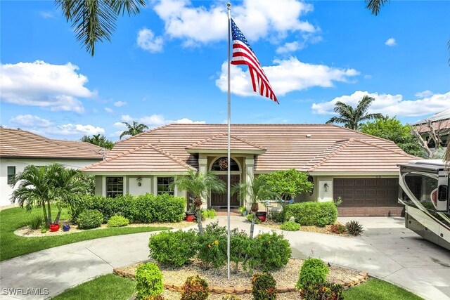 view of front of property featuring a garage