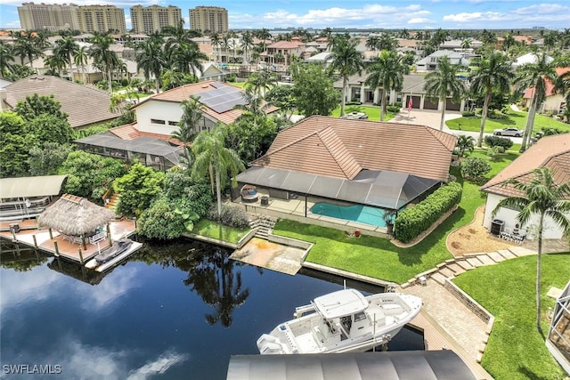 birds eye view of property featuring a water view