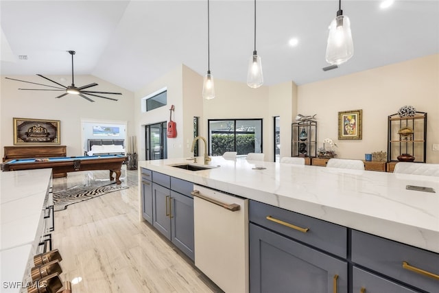 kitchen featuring pendant lighting, a wealth of natural light, light stone countertops, and billiards