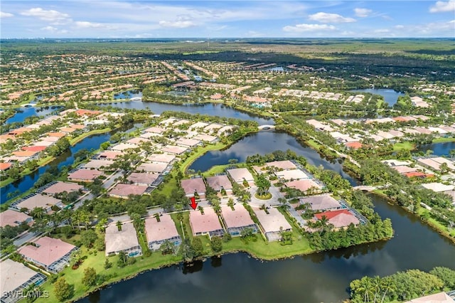 birds eye view of property featuring a residential view and a water view