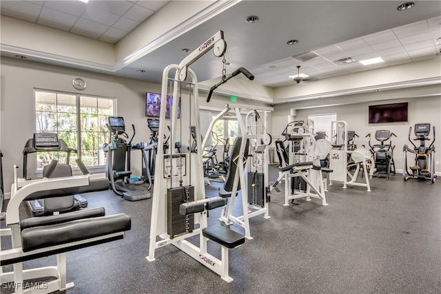 workout area featuring a paneled ceiling