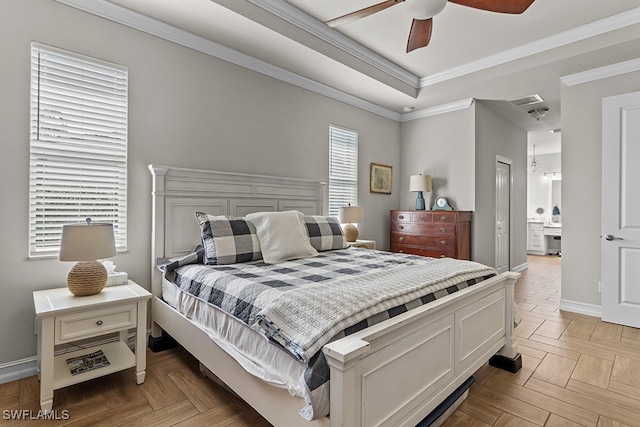 bedroom featuring light parquet floors, crown molding, ceiling fan, and ensuite bathroom