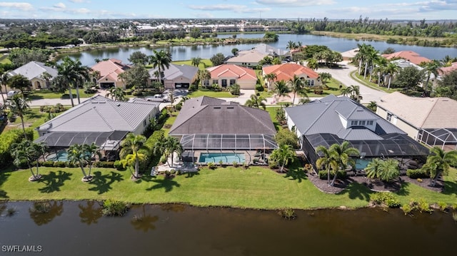 drone / aerial view with a water view