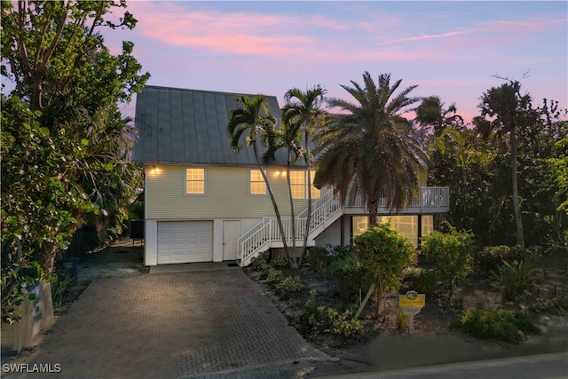 view of front of property with a garage