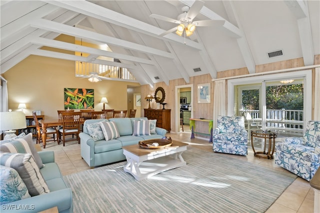 living room featuring beamed ceiling, high vaulted ceiling, ceiling fan, and light tile patterned flooring