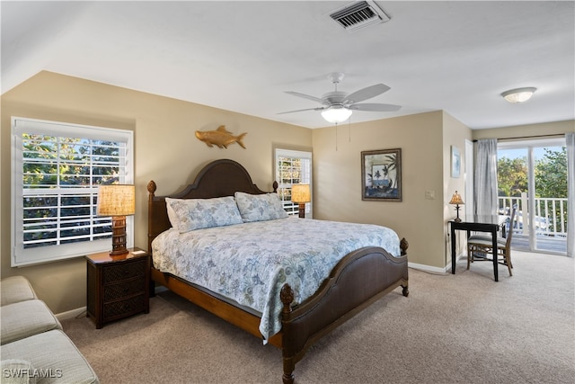 bedroom featuring ceiling fan, light carpet, and access to outside