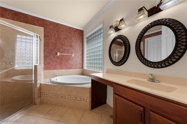 bathroom featuring tile patterned flooring, vanity, ornamental molding, and plus walk in shower