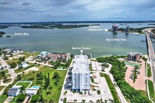 birds eye view of property featuring a water view