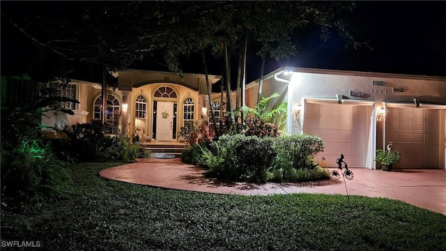 exterior space with a garage