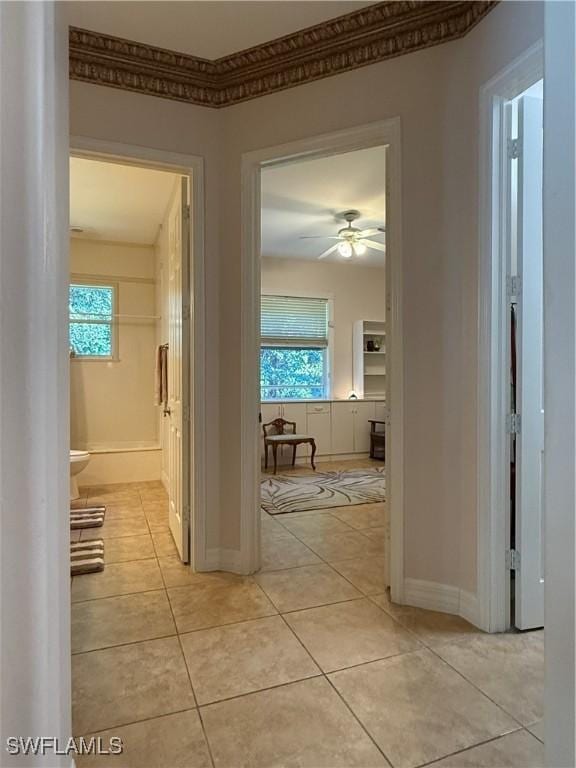 hallway with light tile patterned floors