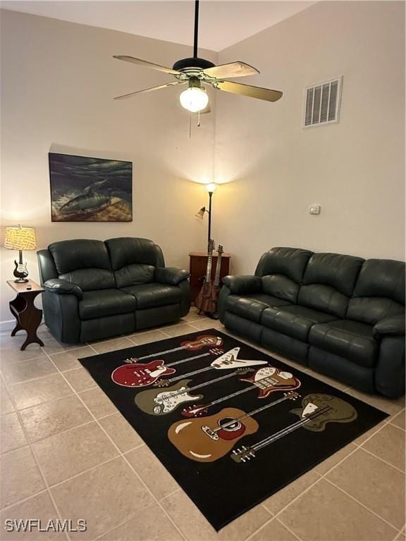 tiled living room featuring ceiling fan