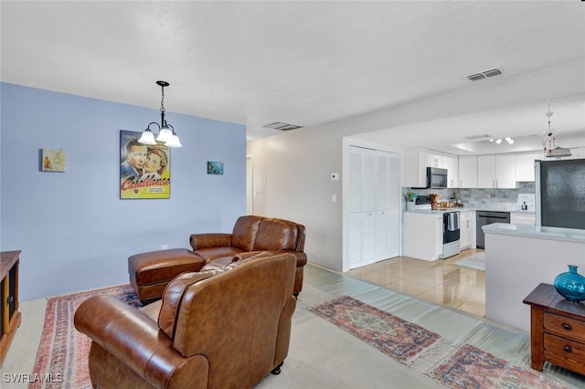 living room with light tile patterned floors