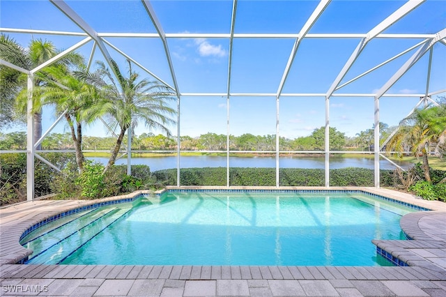 view of pool featuring a water view and a lanai