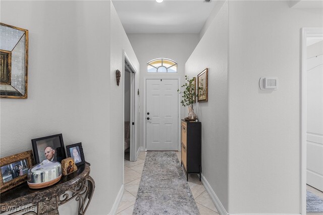 interior space with light tile patterned floors