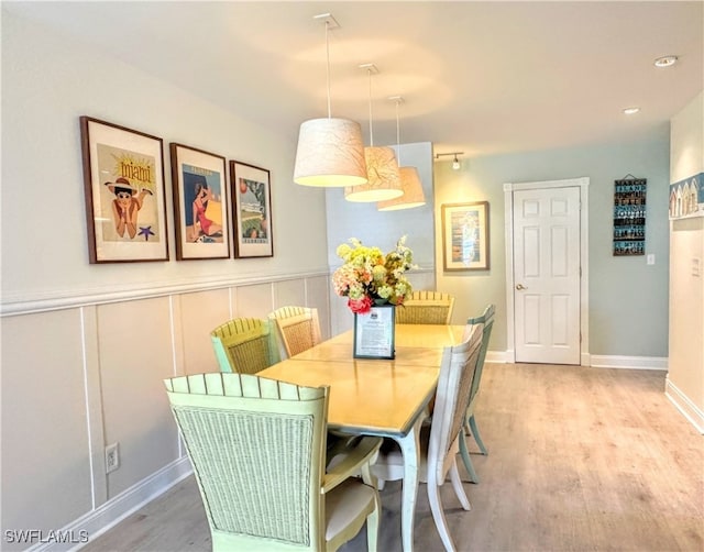 dining area featuring hardwood / wood-style floors