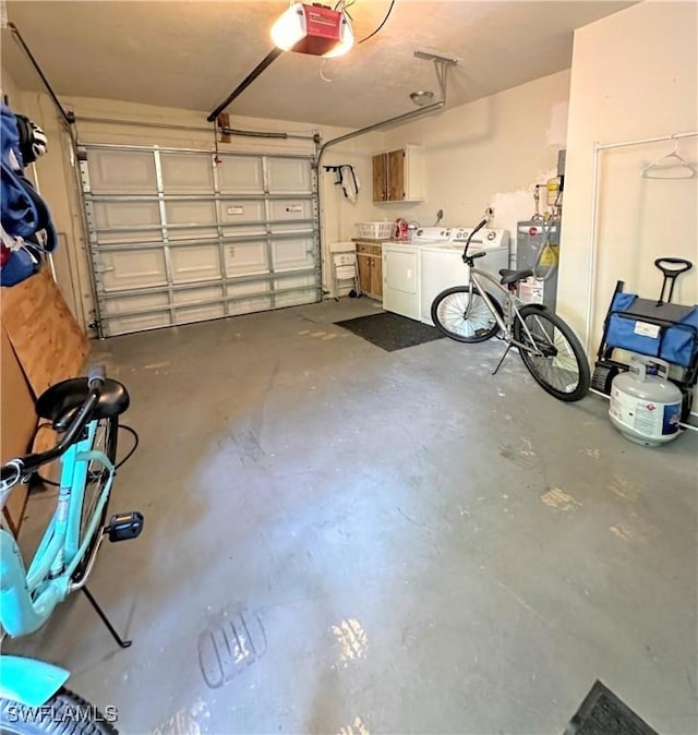 856 98th Ave N, Naples, FL 34108 - garage featuring water heater, a garage door opener, and washing machine and dryer