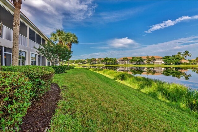 view of yard with a water view