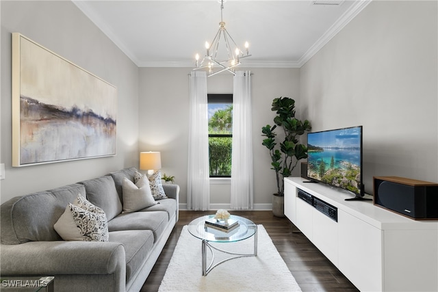 living room with dark wood-type flooring, crown molding, and a notable chandelier