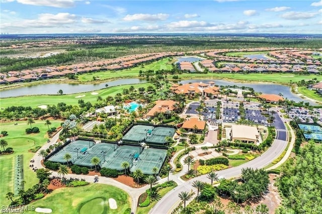 bird's eye view with a water view