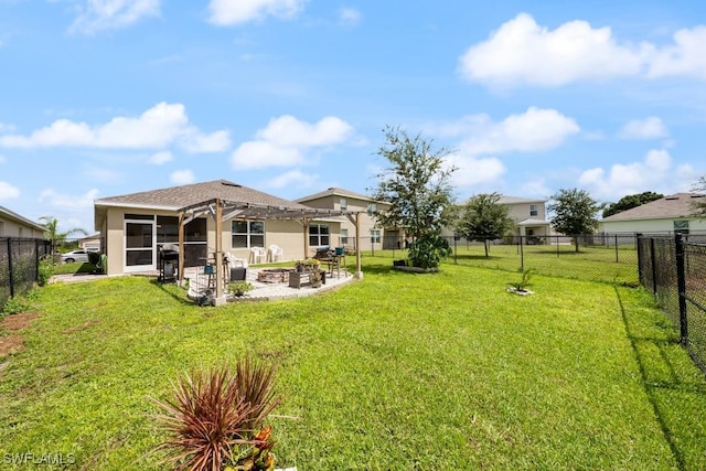 view of yard with a patio area and a fire pit