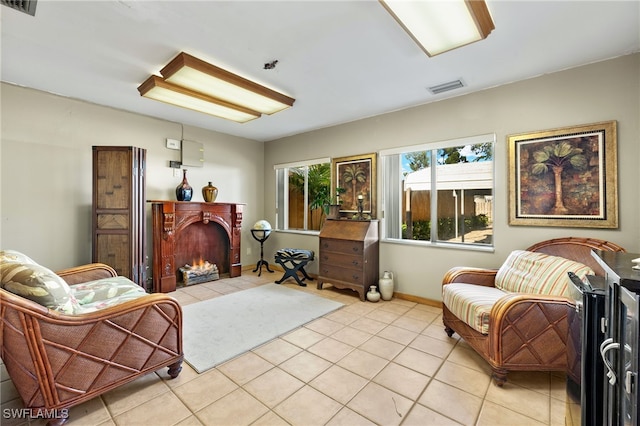 sitting room with light tile patterned floors