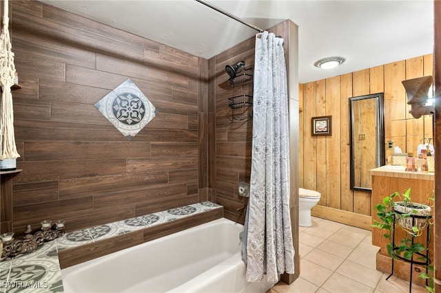 full bathroom featuring shower / tub combo with curtain, wooden walls, toilet, and vanity