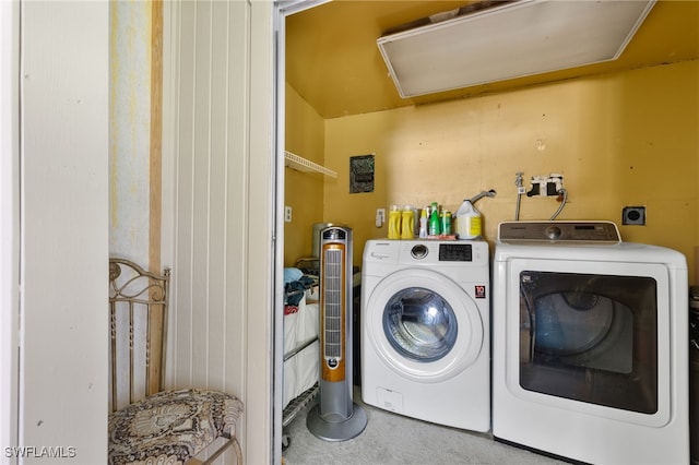 washroom with carpet and independent washer and dryer