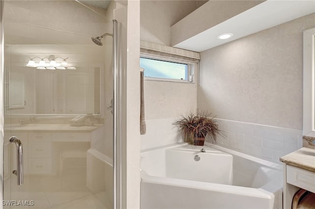 bathroom with vanity and plus walk in shower