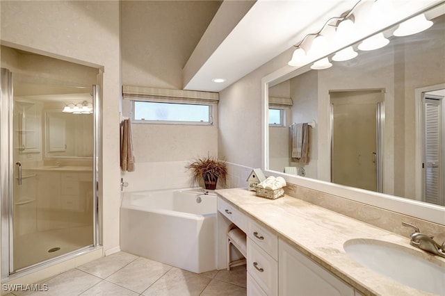 bathroom with vanity, separate shower and tub, and tile patterned flooring