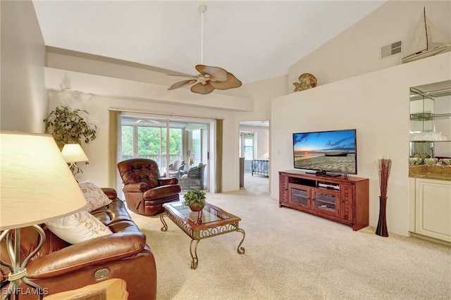 living room featuring light colored carpet, high vaulted ceiling, and ceiling fan