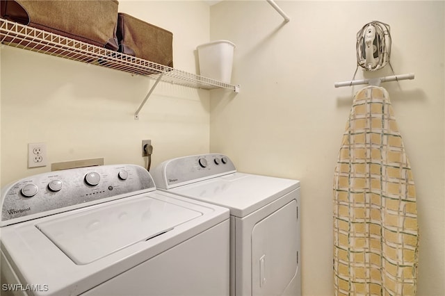 laundry room with washer and dryer