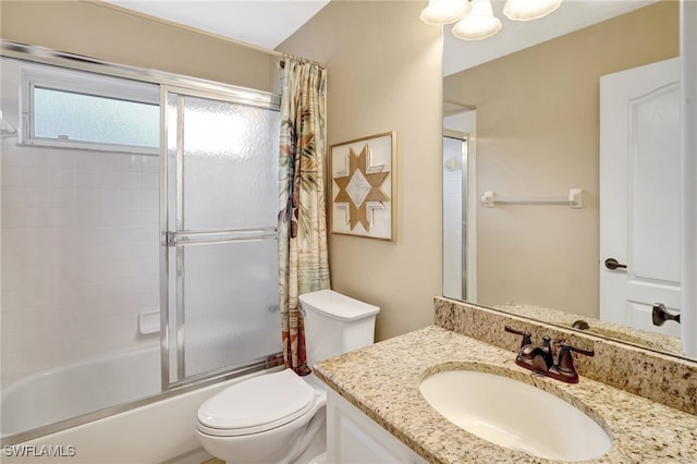 full bathroom featuring vanity, shower / tub combo, and toilet