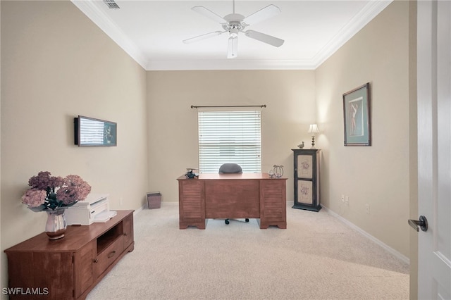 carpeted home office with ceiling fan and ornamental molding