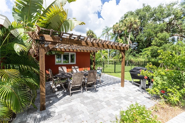 view of patio featuring a pergola