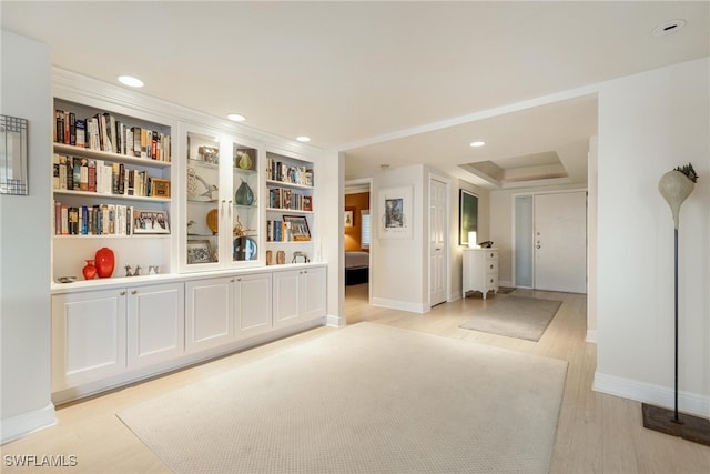 empty room with light hardwood / wood-style flooring