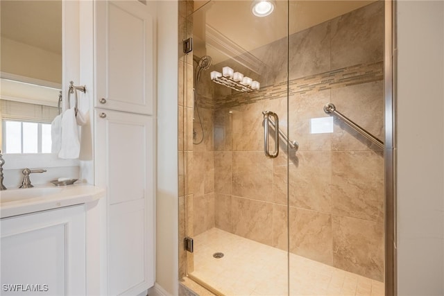 bathroom with vanity and walk in shower