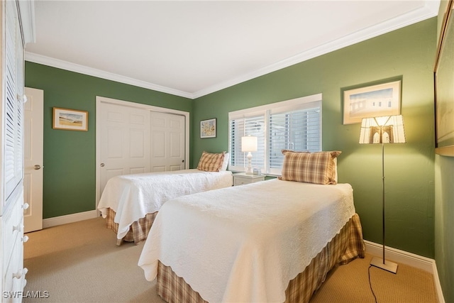 bedroom with a closet, light colored carpet, and ornamental molding