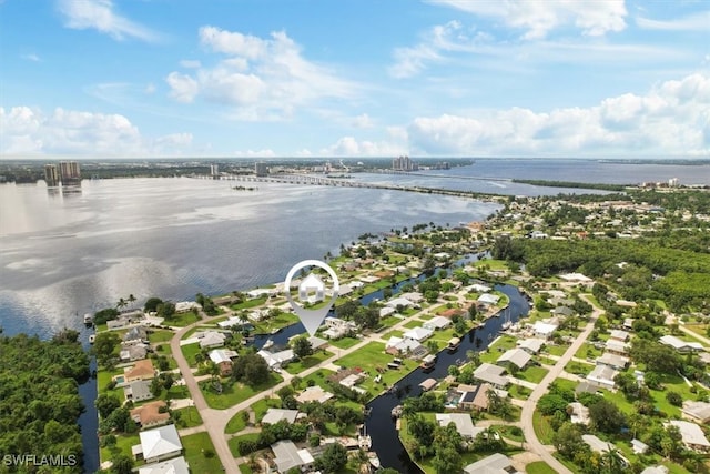 bird's eye view with a water view