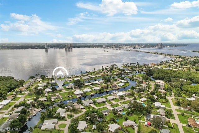 birds eye view of property featuring a water view