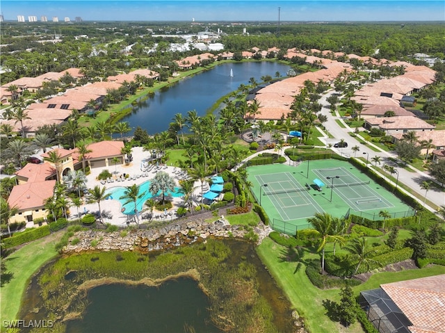 birds eye view of property featuring a water view