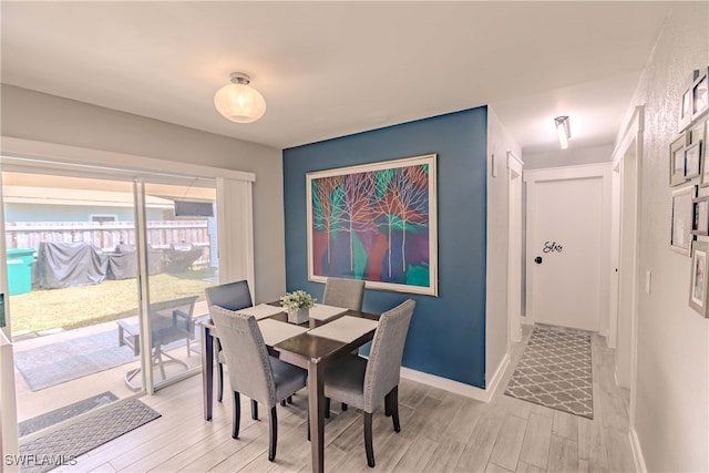 dining room featuring light hardwood / wood-style floors