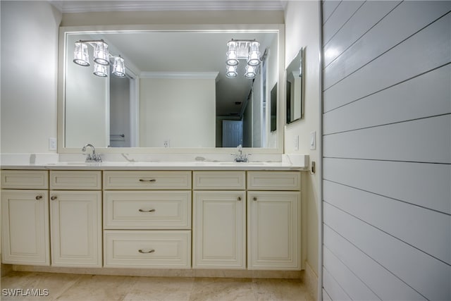 bathroom with crown molding, vanity, and wood walls