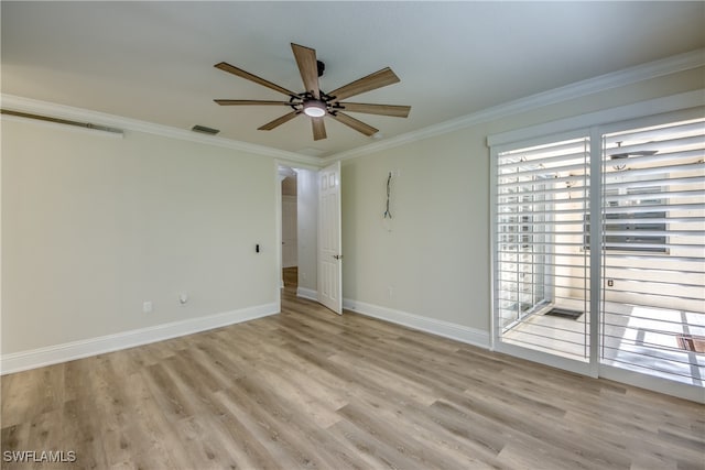 empty room with ceiling fan, light hardwood / wood-style flooring, and crown molding