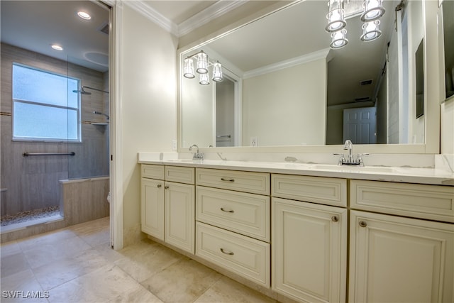 bathroom featuring ornamental molding, toilet, vanity, and tiled shower