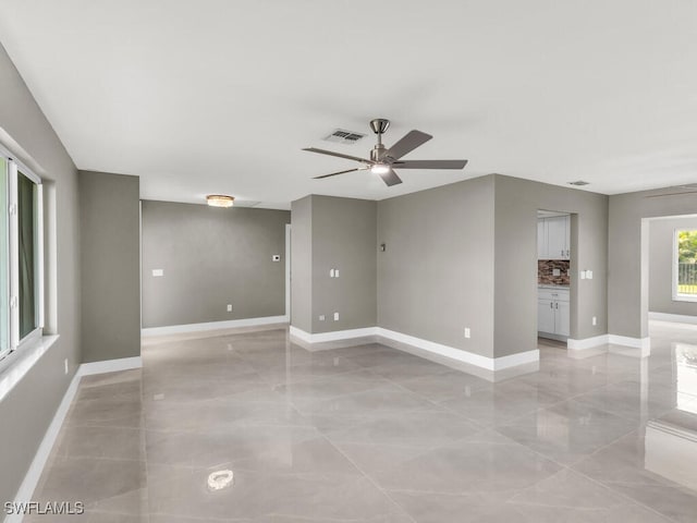 empty room with ceiling fan