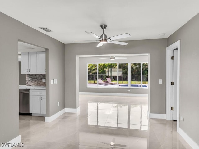 interior space featuring ceiling fan