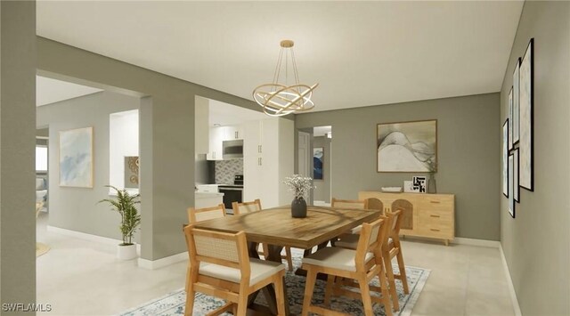 dining area with an inviting chandelier