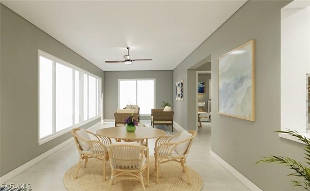 dining room featuring ceiling fan