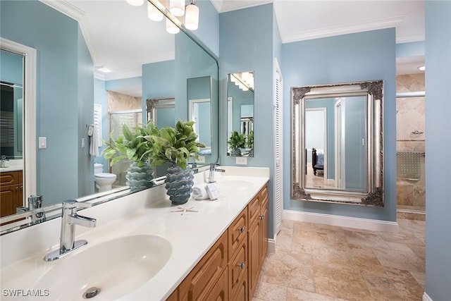 bathroom featuring ornamental molding, an enclosed shower, vanity, and toilet