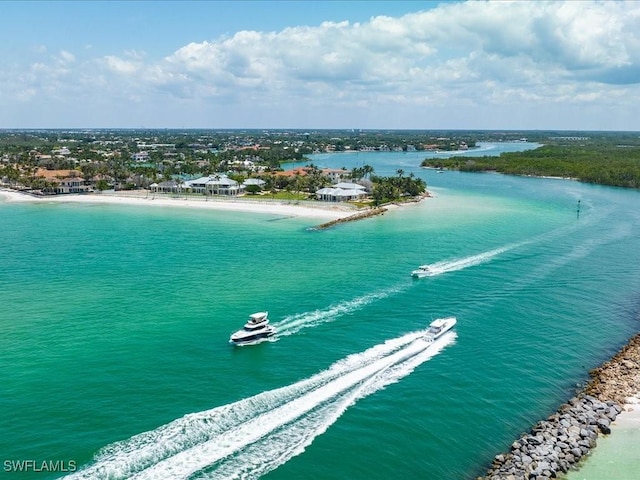 bird's eye view with a beach view and a water view